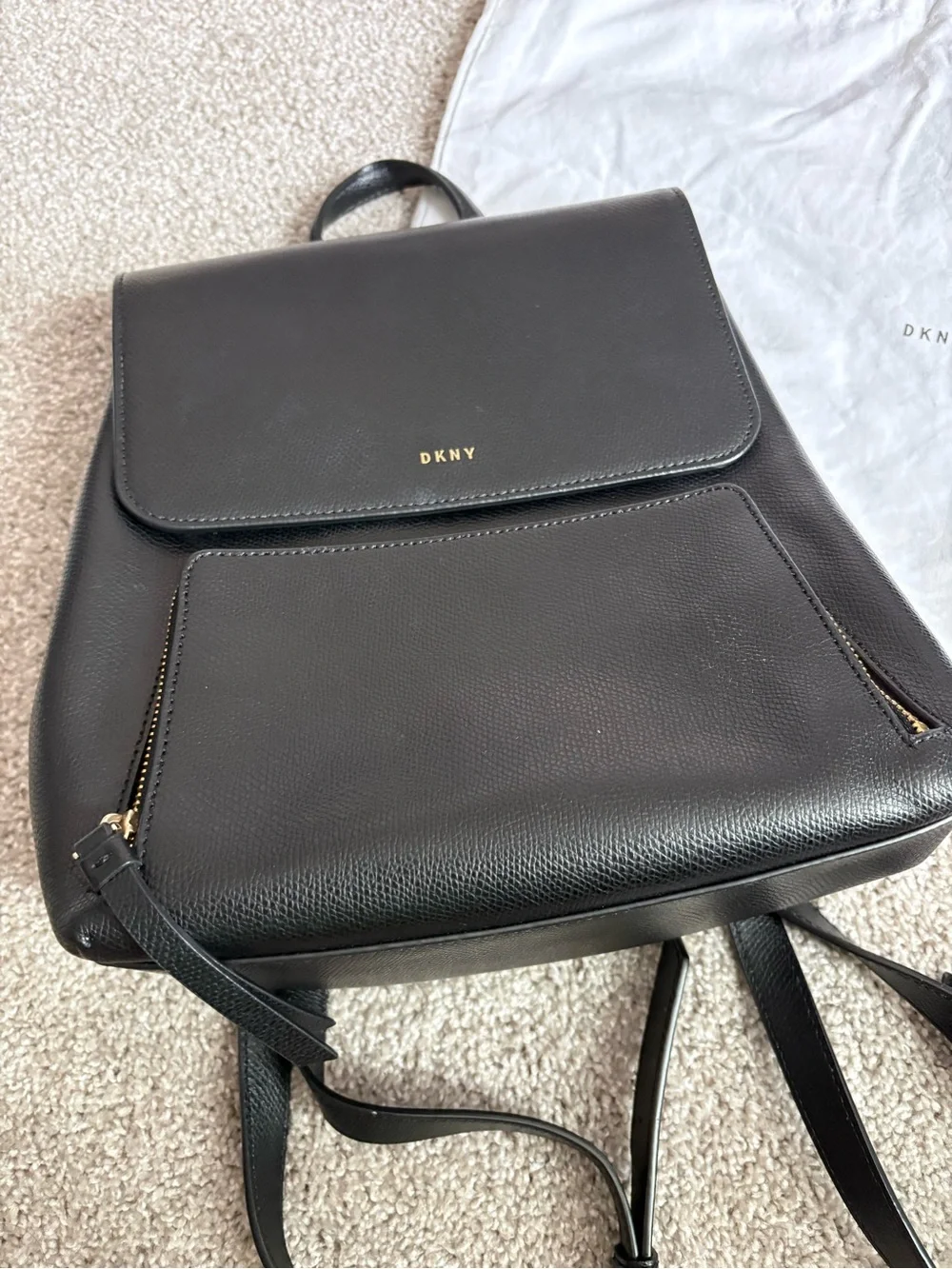 DKNY Black Leather Backpack with Gold Accents
